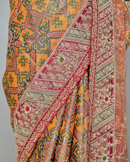 Yellow Tissue Patola Saree with Hand-Stitched Floral Border image 2
