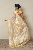 Self Stripe Sheer Tissue Saree With Leaf Border