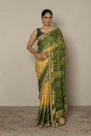 Shaded yellow & Mehendi Green Bandhej Ghatchola With Zardozi Border