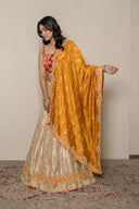 Ivory tissue Lehenga Set with mustard yellow banarasi bandhej dupatta