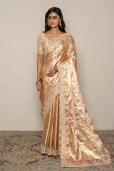 Peach Tissue Weave Saree With Heavy Border