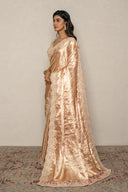 Peach Tissue Weave Saree With Heavy Border