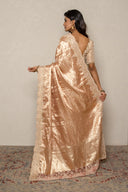 Peach Tissue Weave Saree With Heavy Border