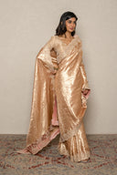Peach Tissue Weave Saree With Heavy Border