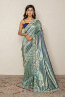 Teal Green Brocade Silk blend Saree With Intricate Zari Border