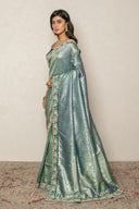Teal Green Brocade Silk blend Saree With Intricate Zari Border