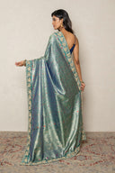 Teal Green Brocade Silk blend Saree With Intricate Zari Border