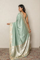 Pastel Mint Green Handloom Silk Saree With Zari Embroidered Border