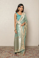 Pastel Mint Green Handloom Silk Saree With Zari Embroidered Border
