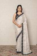 Elegant Silver Shimmer Tissue Saree With Black Chekered Border