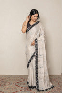 Elegant Silver Shimmer Tissue Saree With Black Chekered Border