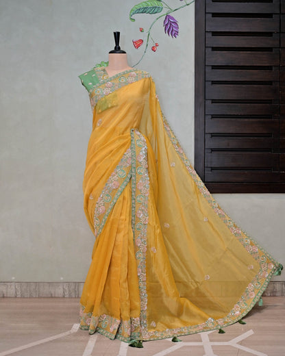 Yellow Tissue Saree with Sequence and Cutdana Work image 0