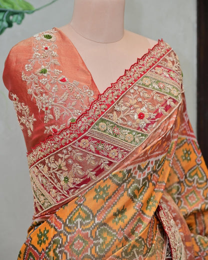 Yellow Tissue Patola Saree with Hand-Stitched Floral Border image 1